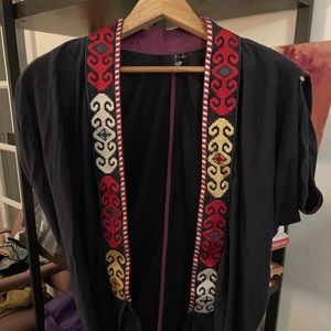 Draped and embroidered navy vest